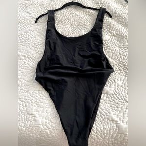 Swimsuit, women’s 1piece by Aerie.Never worn,SZ medium.Basic black